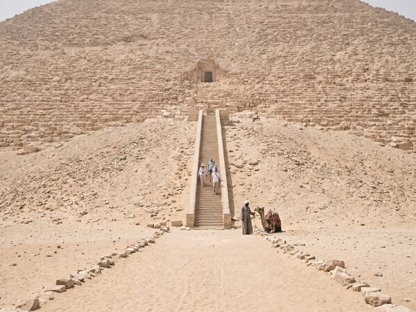 Visitors climbing to the entrance of the Red Pyramid