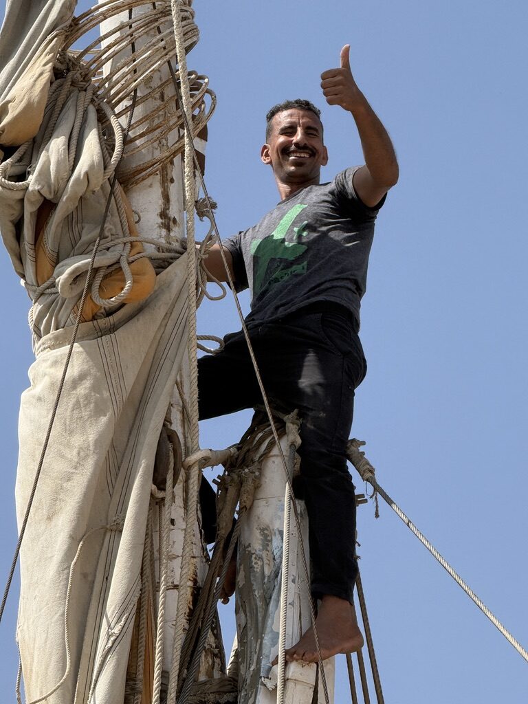 Traditional Egyptian felucca on the Nile at sunset