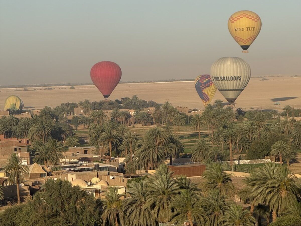 Hot air balloons at sunrise over Luxor