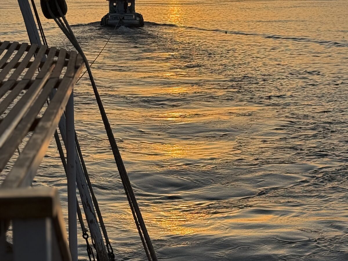Dahabiya sailing boat at sunset on the Nile